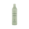 A bottle of Aveda Pure Abundance Volumizing Shampoo for fine hair