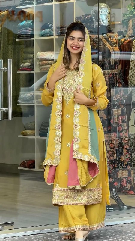 Yellow Faux Georgette palazzo suit with heavy embroidery and sequence work