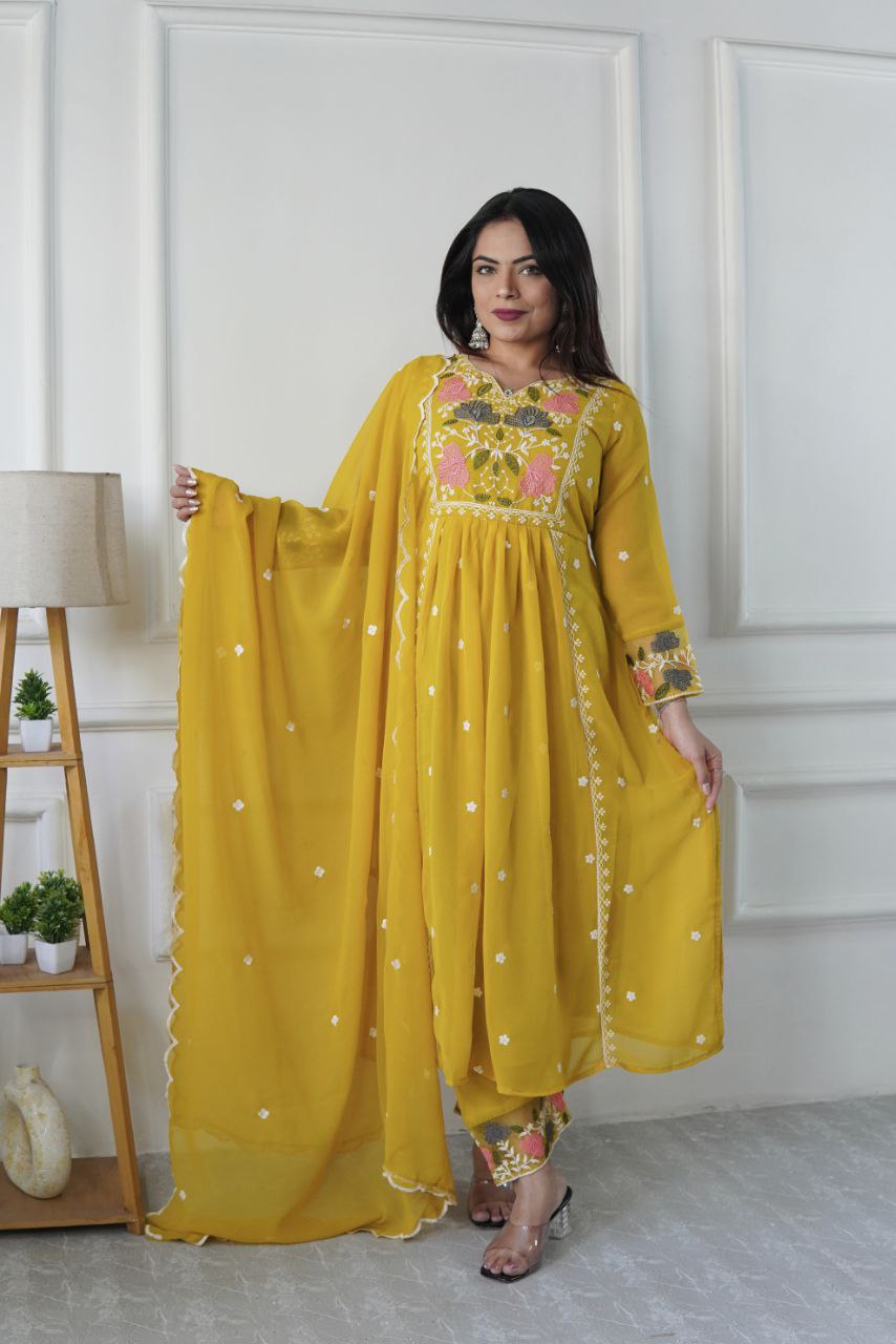 Bright yellow georgette salwar suit with detailed embroidery