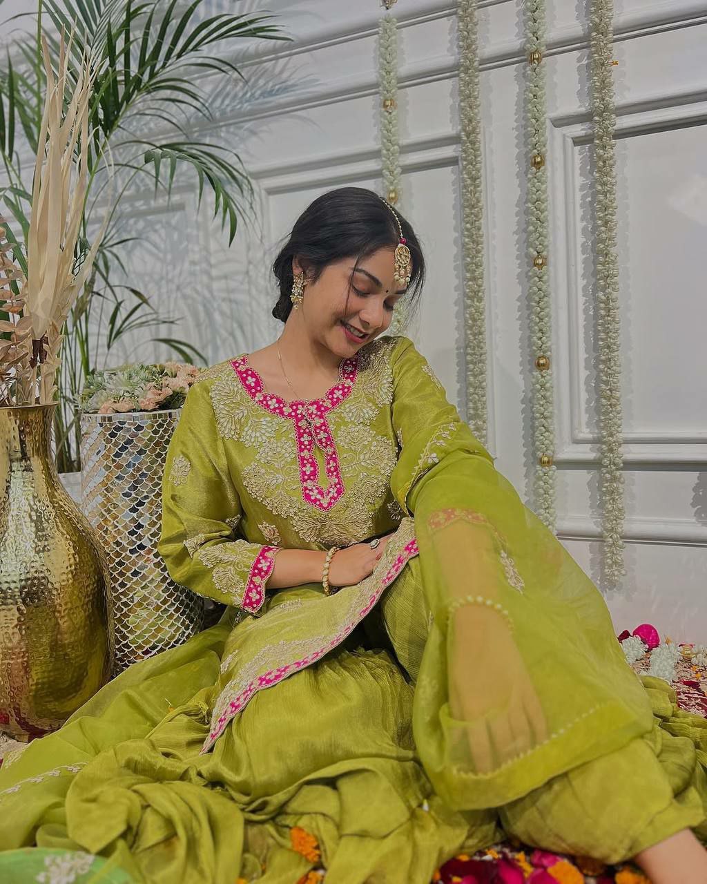 Lime green Chinon silk sharara suit with heavy embroidery and sequins