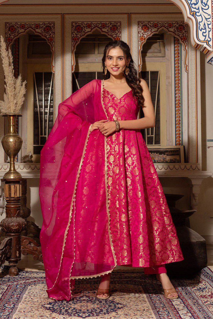 Pink Jacquard Silk gown with intricate weaving patterns and a matching dupatta.