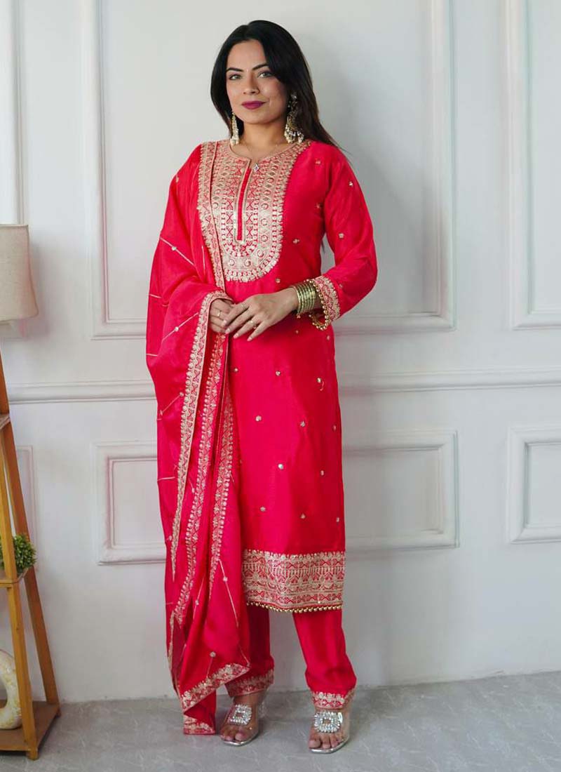 Red silk salwar suit with intricate embroidery work