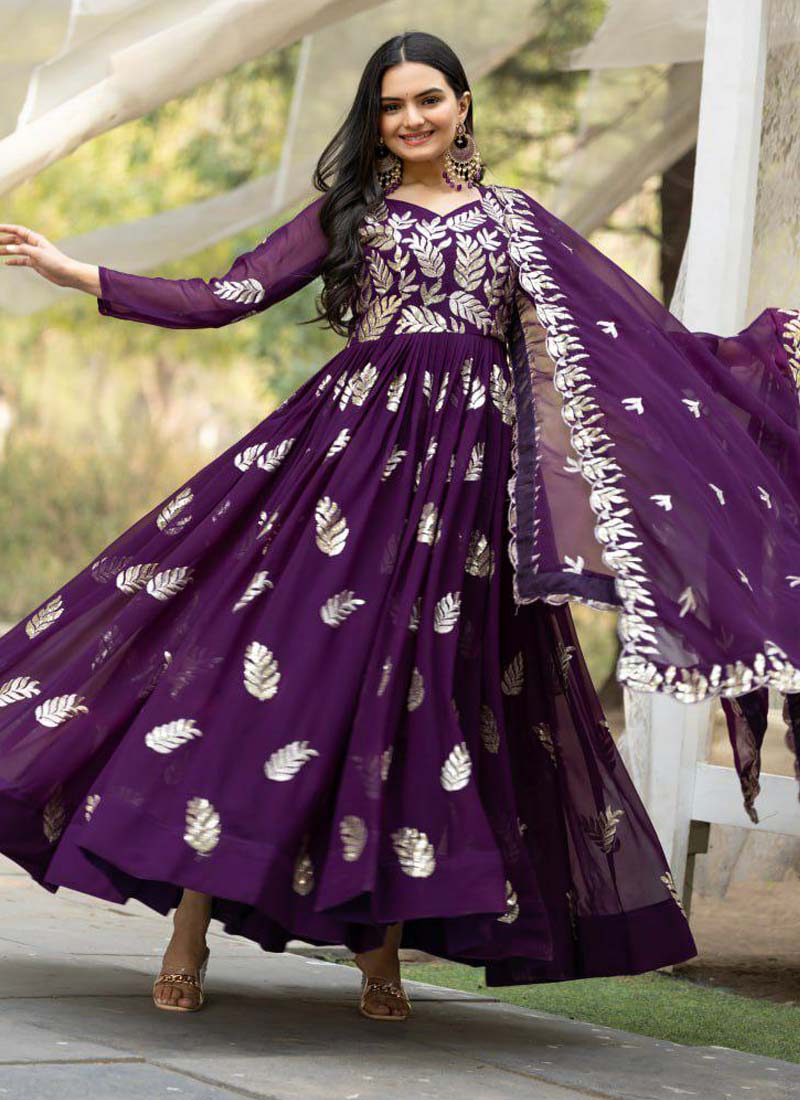 Violet Fox Georgette gown with heavy gold sequence thread work and matching dupatta