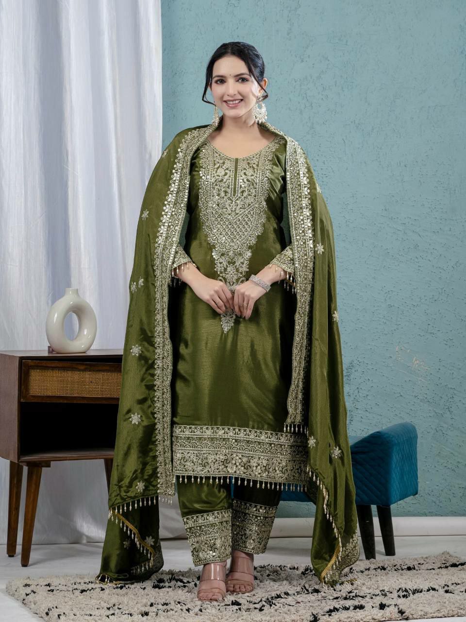 Mahendi Chinon Silk salwar suit with heavy sequence embroidery and detailed sleeves.