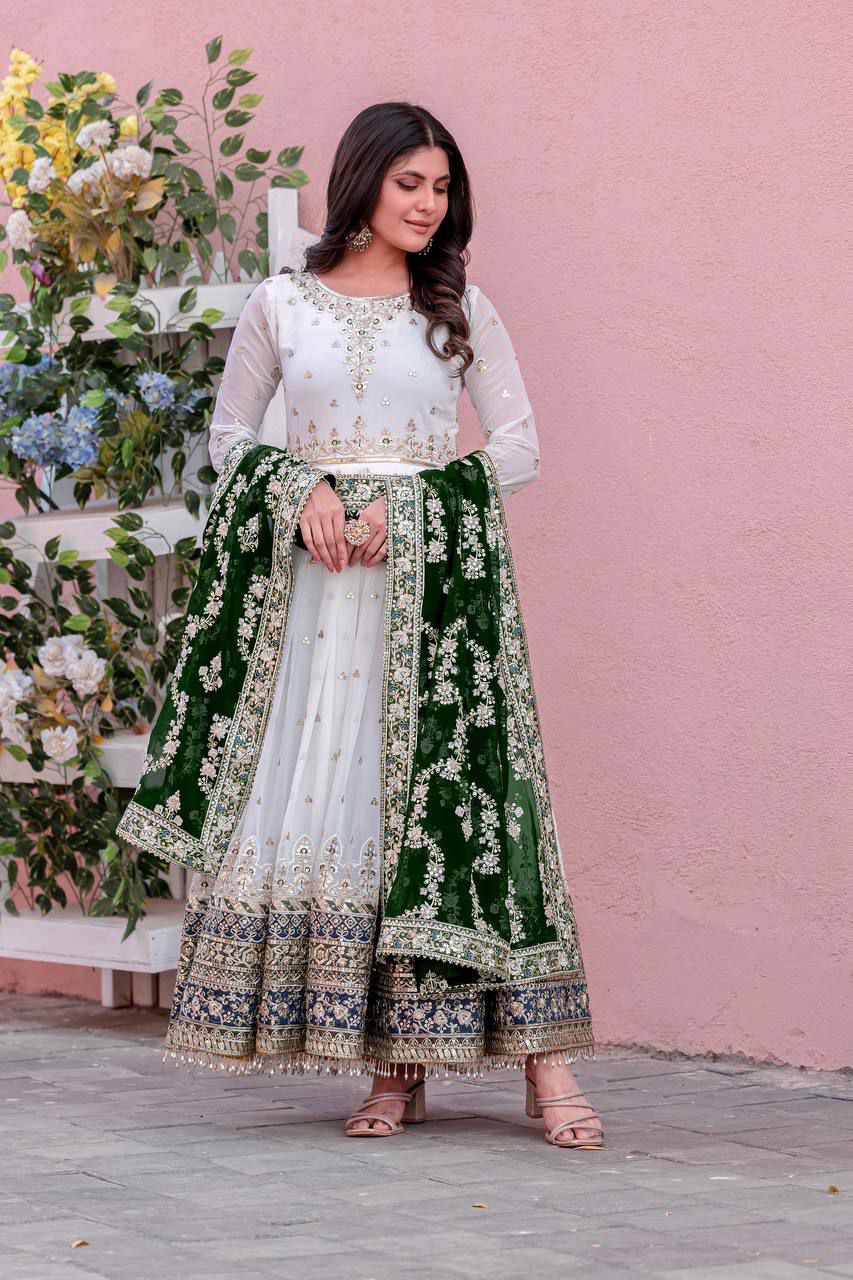 Off White faux georgette Anarkali gown with embroidery, sequence work, and latkan border