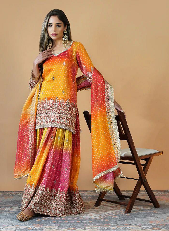 Yellow and pink Chinon silk palazzo suit with intricate embroidery and a comfortable micro inner lining.