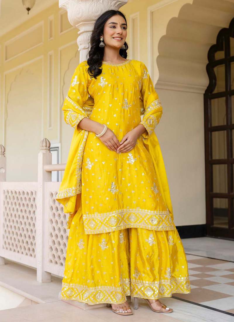 Yellow Chinon silk sharara suit with beautiful sequence embroidery work.