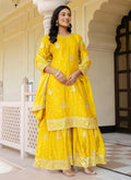 Yellow Chinon silk sharara suit with beautiful sequence embroidery work.