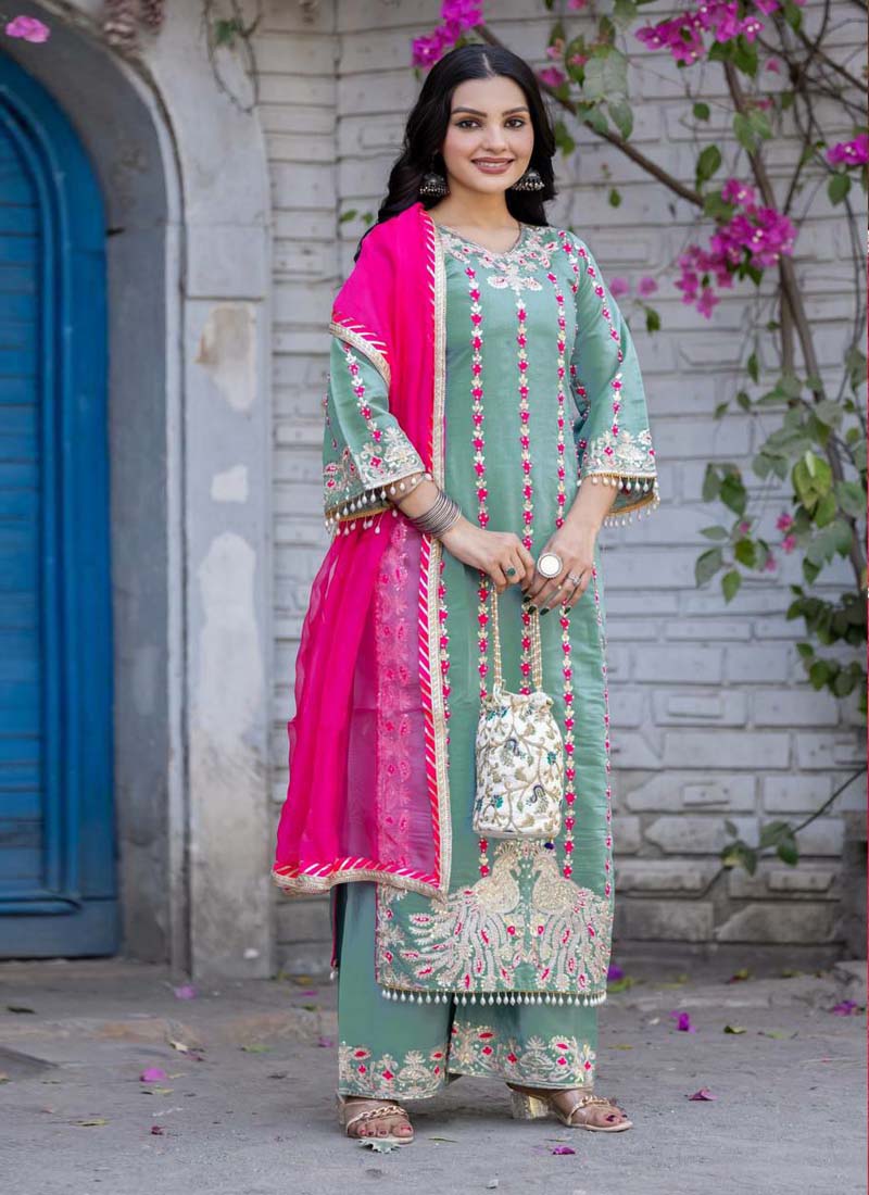 Sea Green Roman Silk salwar suit with detailed hand embroidery