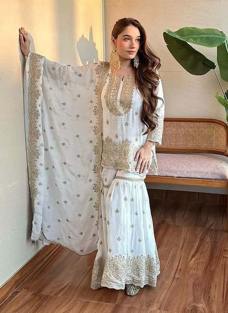 Off White Chinon Silk sharara suit with detailed embroidery and sequence work