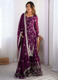 Purple faux georgette palazzo suit featuring intricate thread and sequence embroidery.