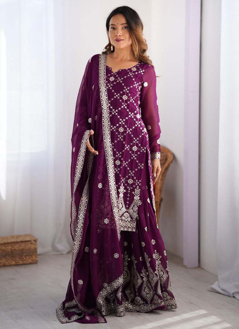 Purple faux georgette palazzo suit featuring intricate thread and sequence embroidery.