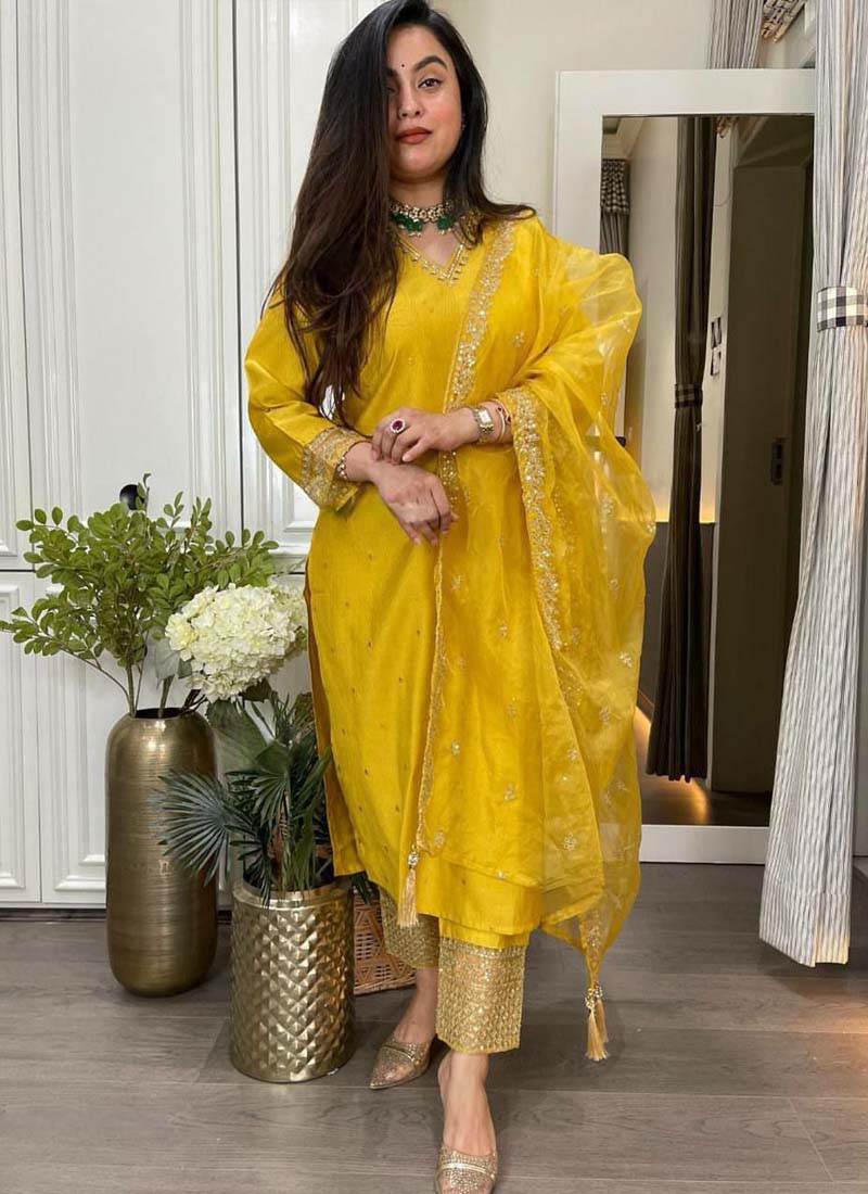 Yellow Roman silk salwar suit with mirror and sequence embroidery