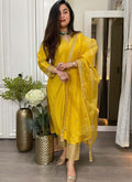 Yellow Roman silk salwar suit with mirror and sequence embroidery