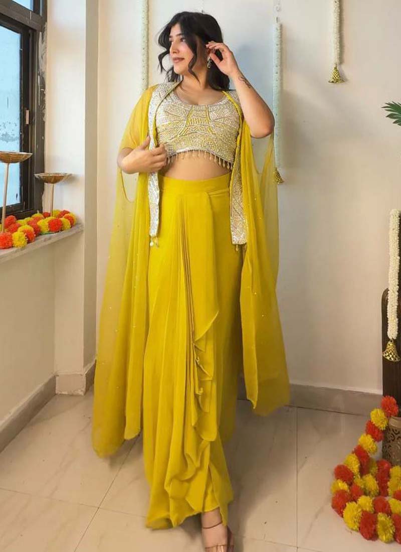 Yellow georgette western suit featuring front sequence embroidery and silver crystal latkan lace border