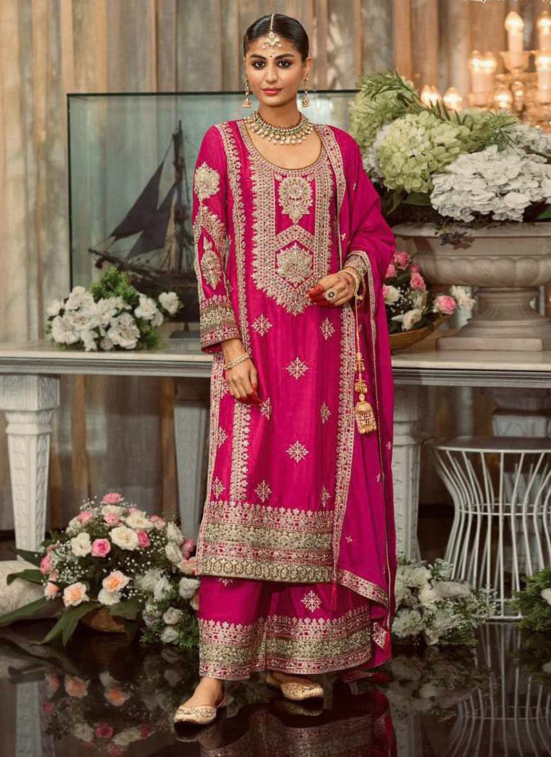 Pink Georgette palazzo suit with intricate embroidery and pearl moti detailing