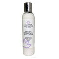 Glimmer Goddess Organic Coconut Milk Body Lotion bottle in white and purple.