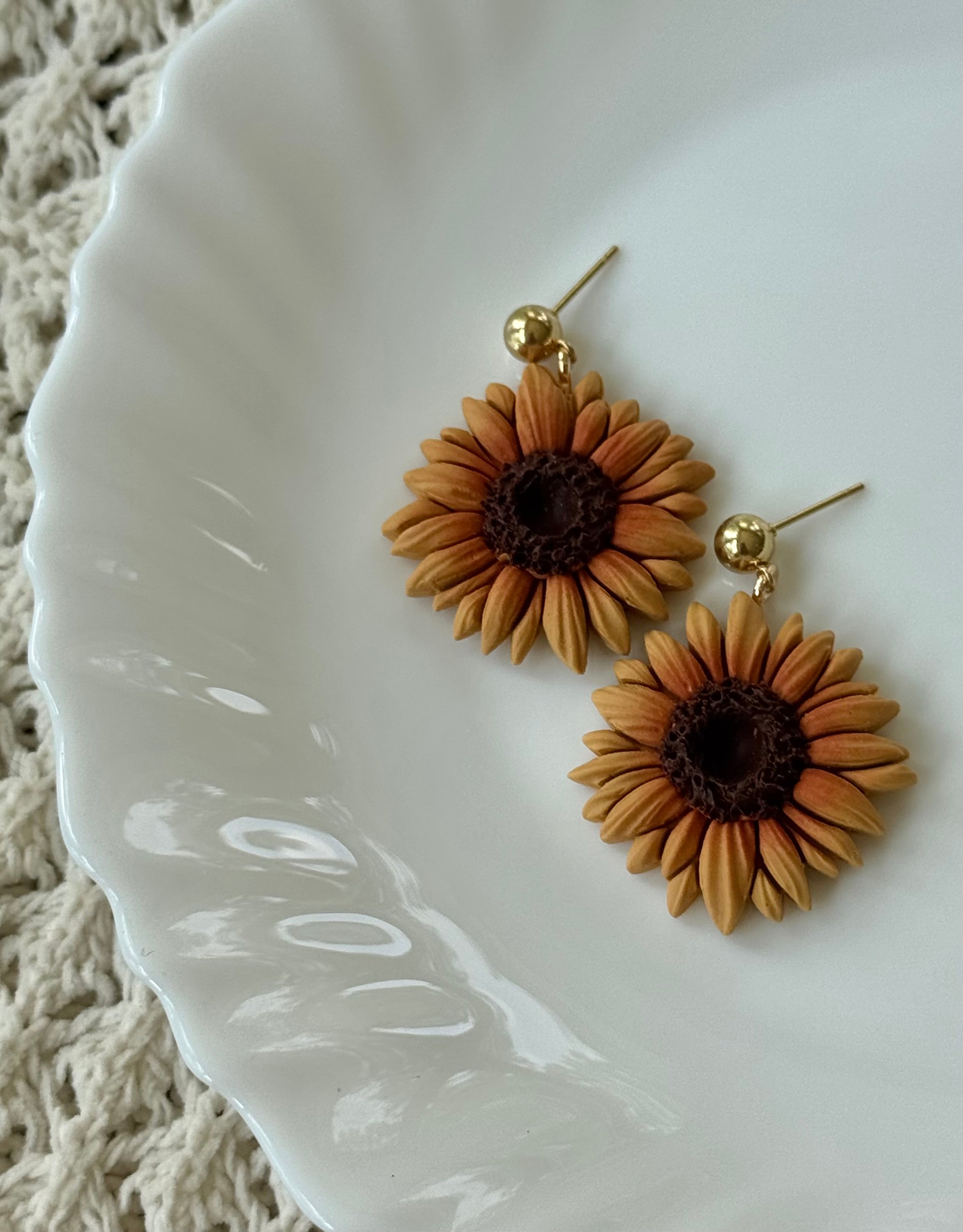 Sunflower Drops polymer clay earrings featuring yellow, brown, and gold colors.