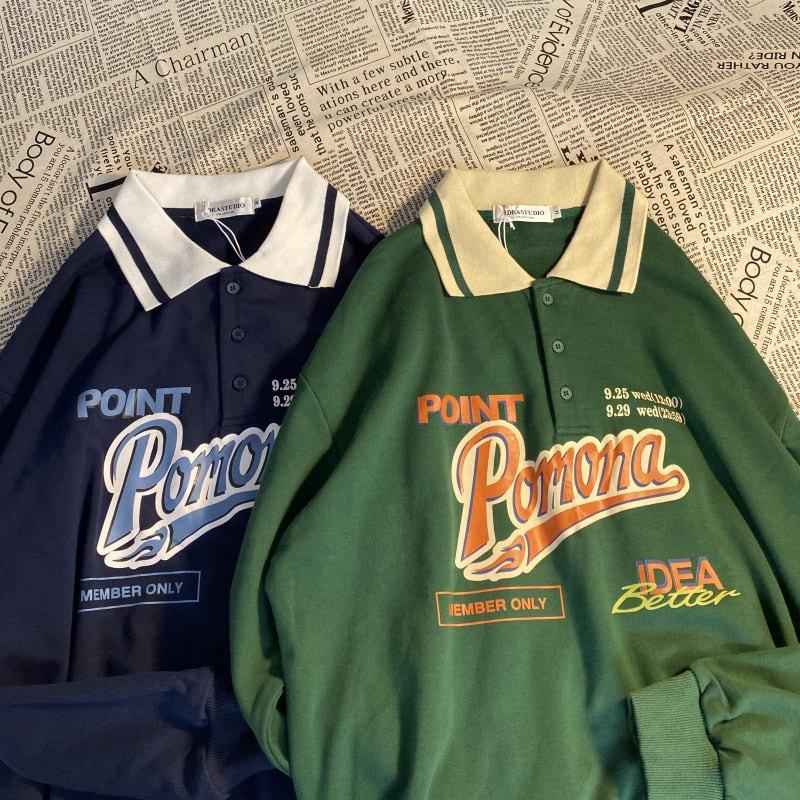 Women's oversized polo collar hoodie in navy blue and dark green with vintage 'Pomona' graphic print, styled for casual and street fashion.