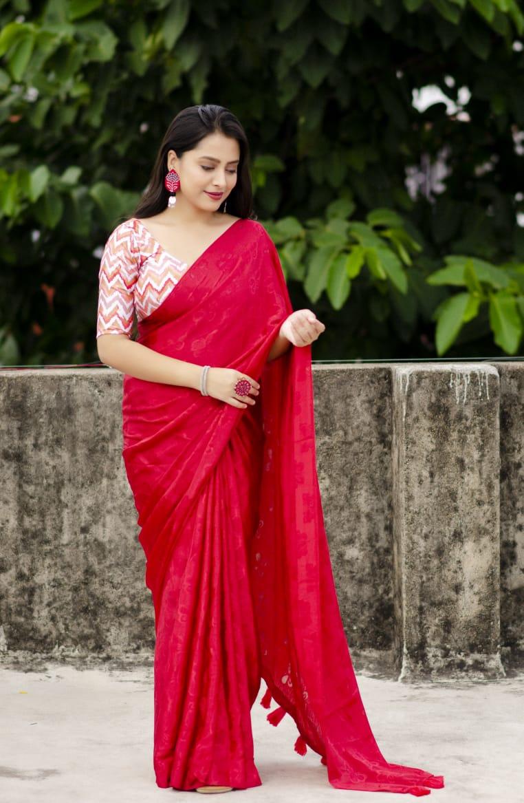 Red silk blend saree with butterfly motifs and zig-zag mulberry silk blouse