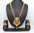 Close-up view of a Rajwadi polish brass necklace featuring intricate stone embellishments.