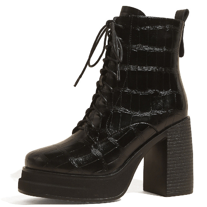 Women's black crocodile embossed cow leather chunky heel ankle boots with lace-up front.