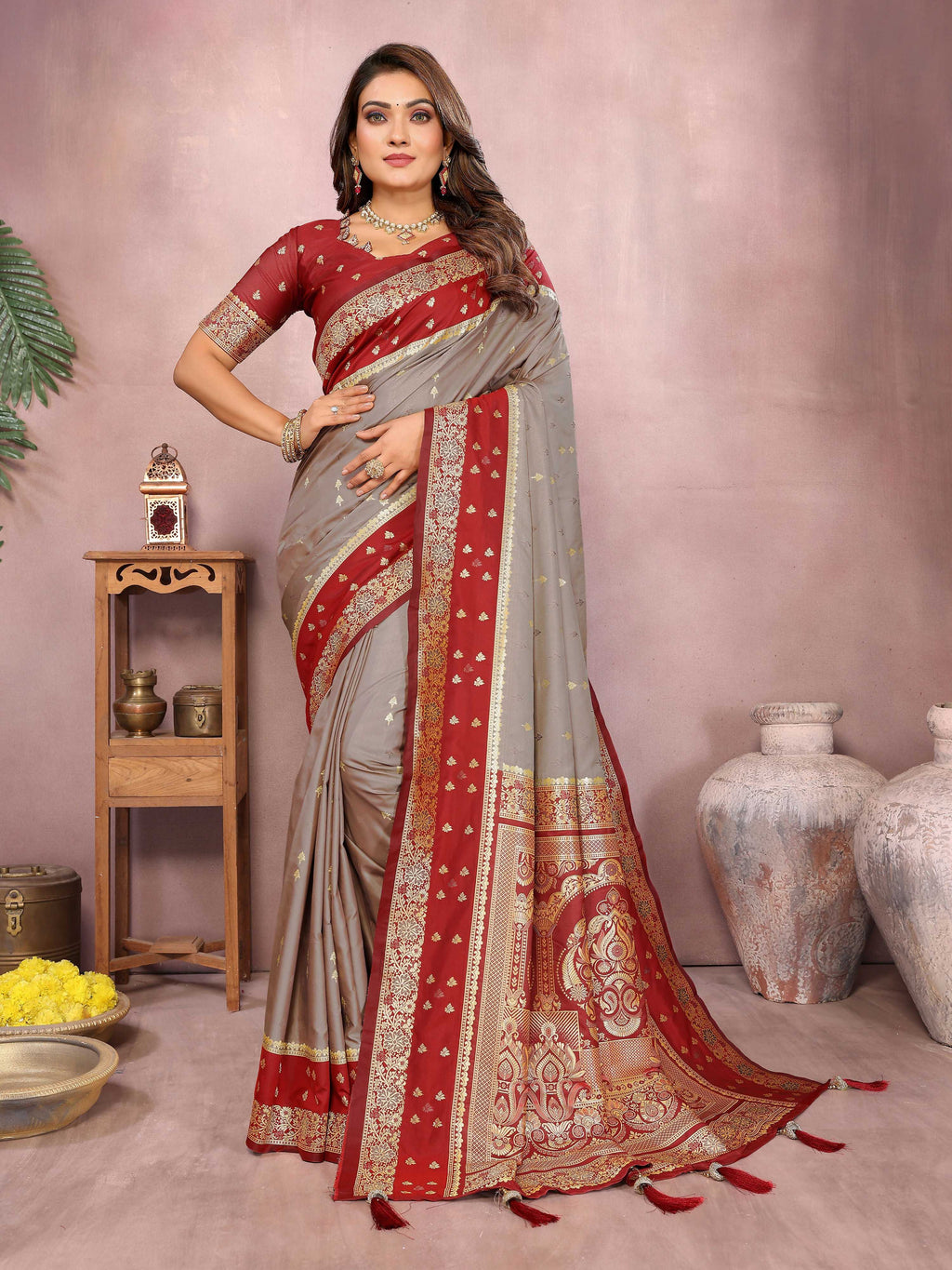 Aastha Fashion grey Kalamkari silk saree with zari weaving and a contrasting red blouse