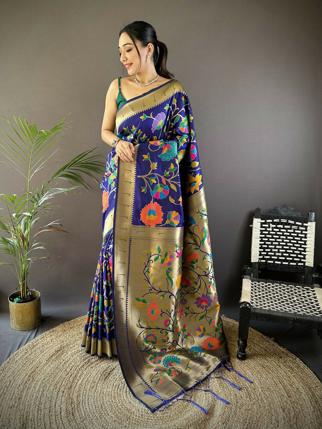 Blue soft silk Paithani saree with gold zari-woven floral motifs