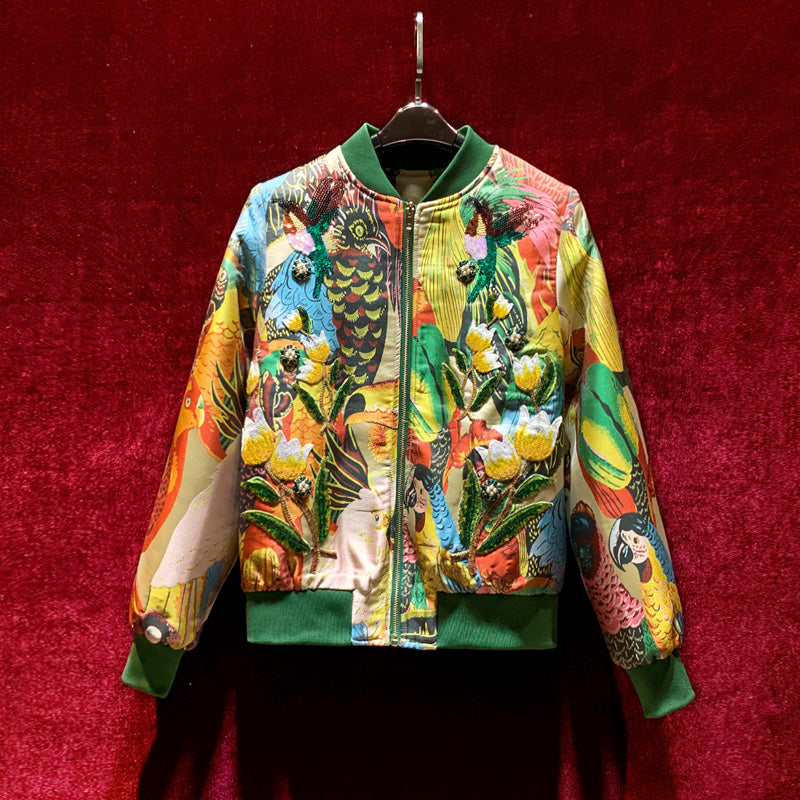 Women's retro multicolor jacquard bomber jacket with vibrant embroidered parrot and floral print, green ribbed trim, and a zip front closure.