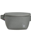 Minimalist grey hip bag worn as a crossbody for urban lifestyle photography