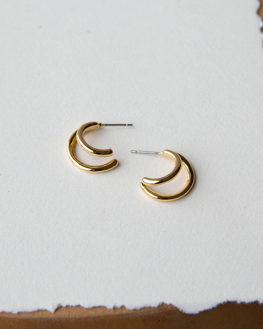 Minimalist double hoop earrings in polished 14K gold plate with a post closure