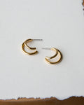 Minimalist double hoop earrings in polished 14K gold plate with a post closure