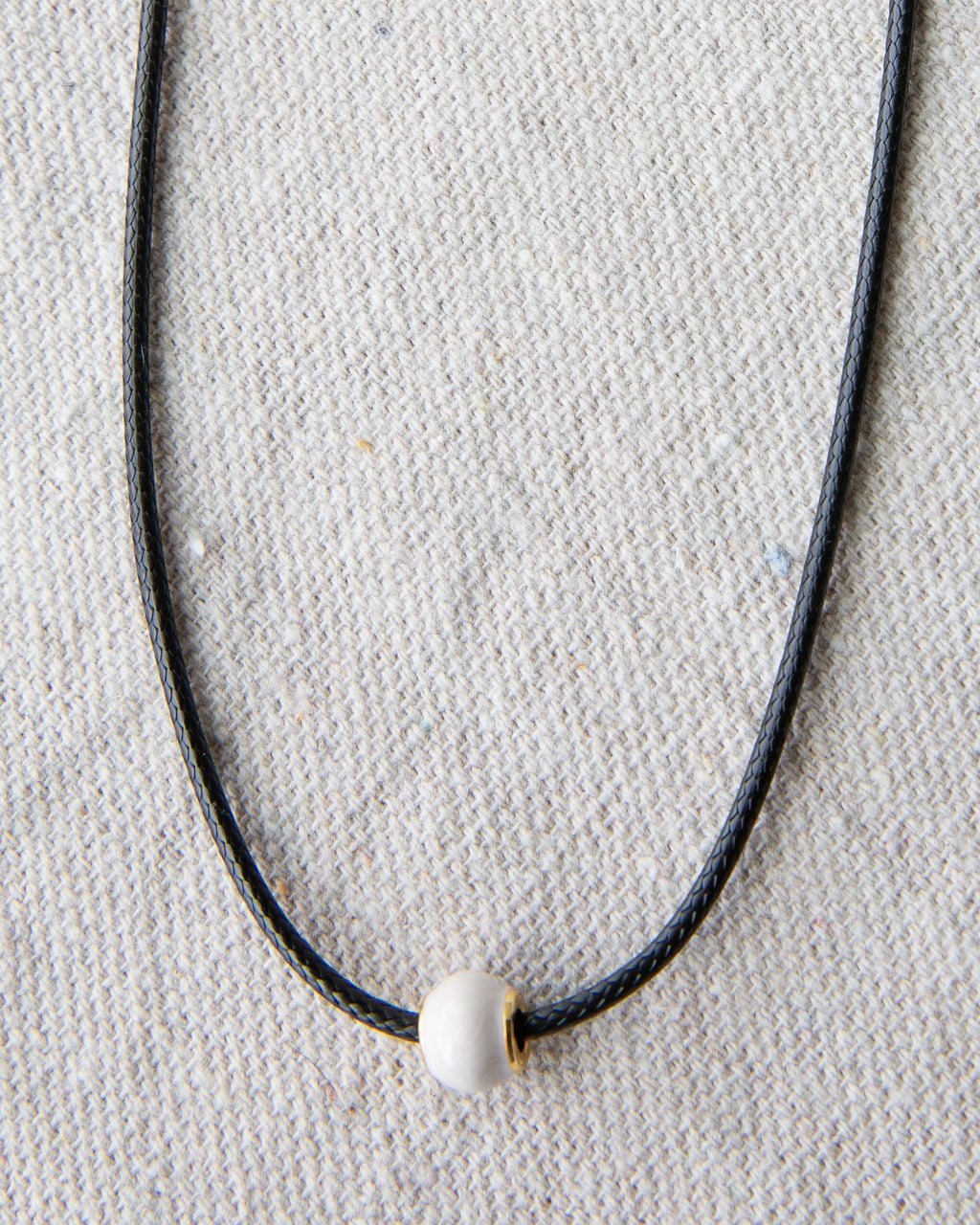 Minimalist Pearl and Cord Choker Necklace with Gold-Plated Details