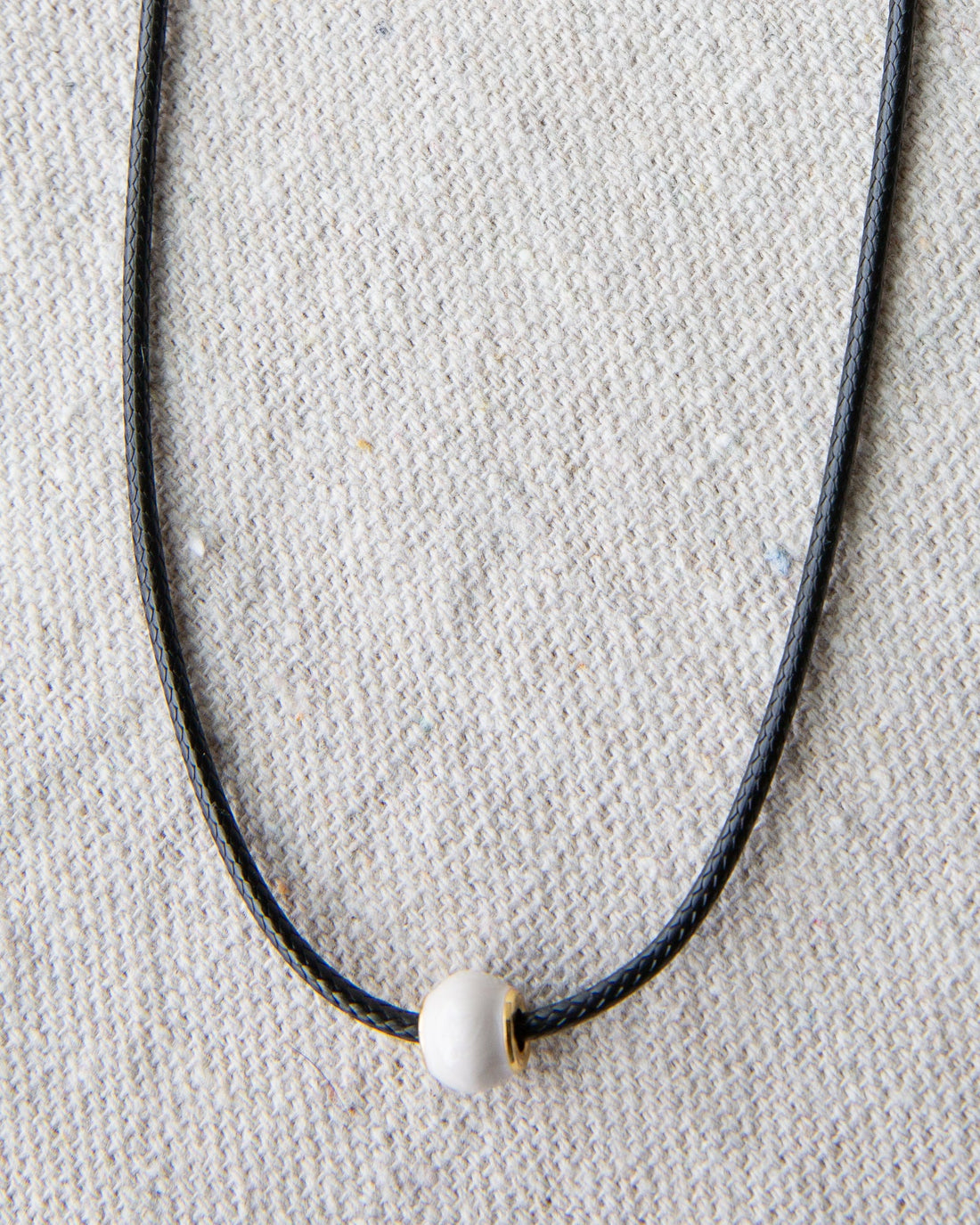Minimalist Pearl and Cord Choker Necklace with Gold-Plated Details