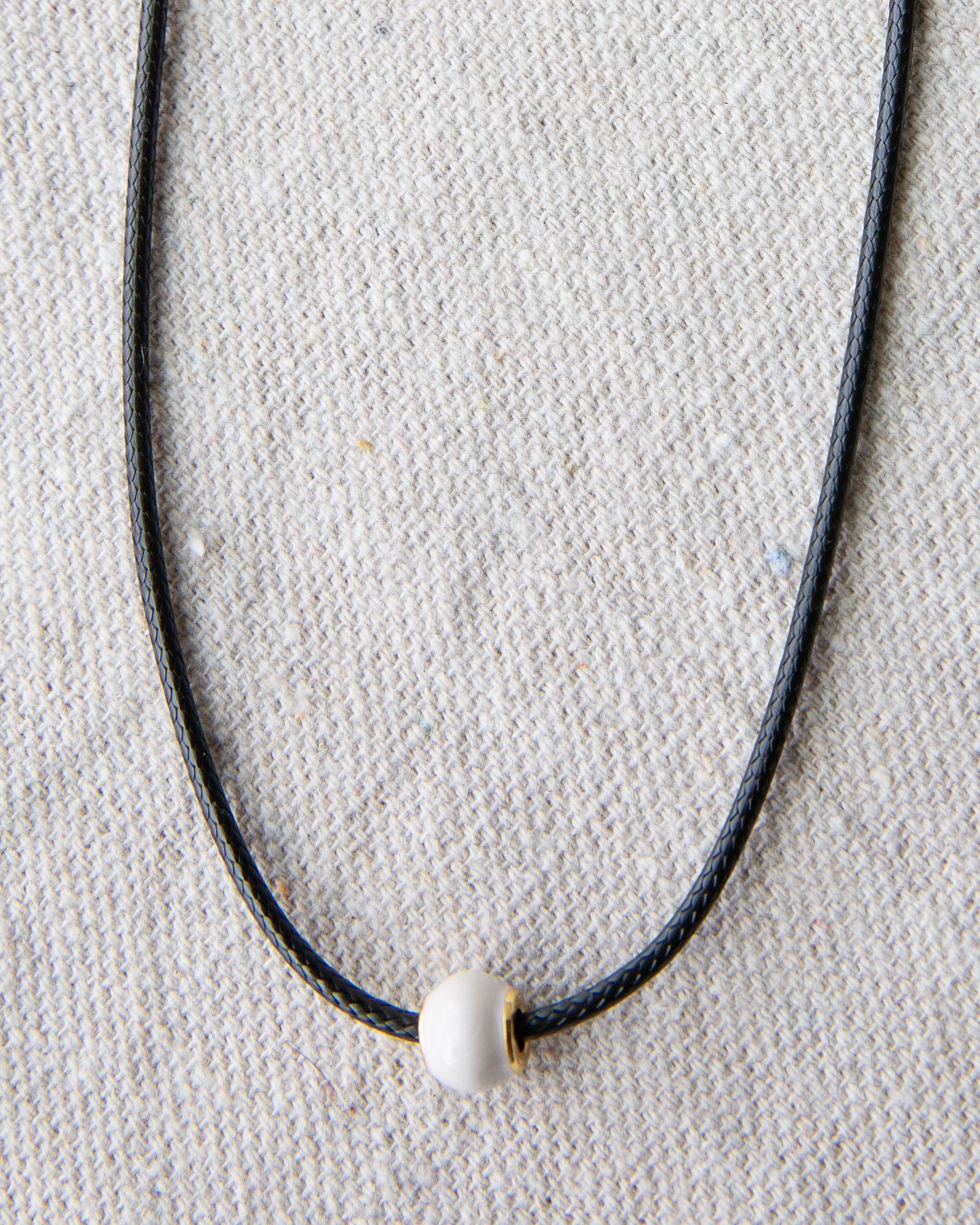 Minimalist Pearl and Cord Choker Necklace with Gold-Plated Details