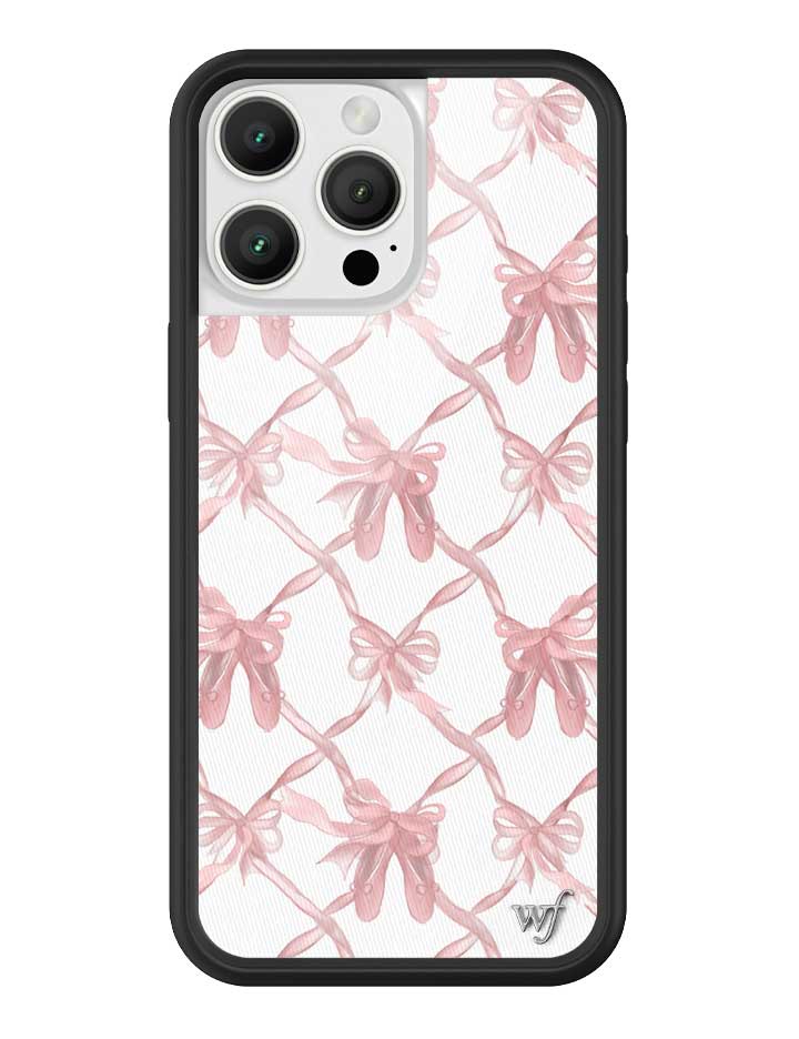 On Pointe iPhone case featuring a white background with a lattice pattern of pink ribbons and ballet slippers, framed by a black rubber bumper.