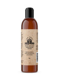Bottle of Johnny Slicks organic hand whipped beard, thinning hair, and face wash