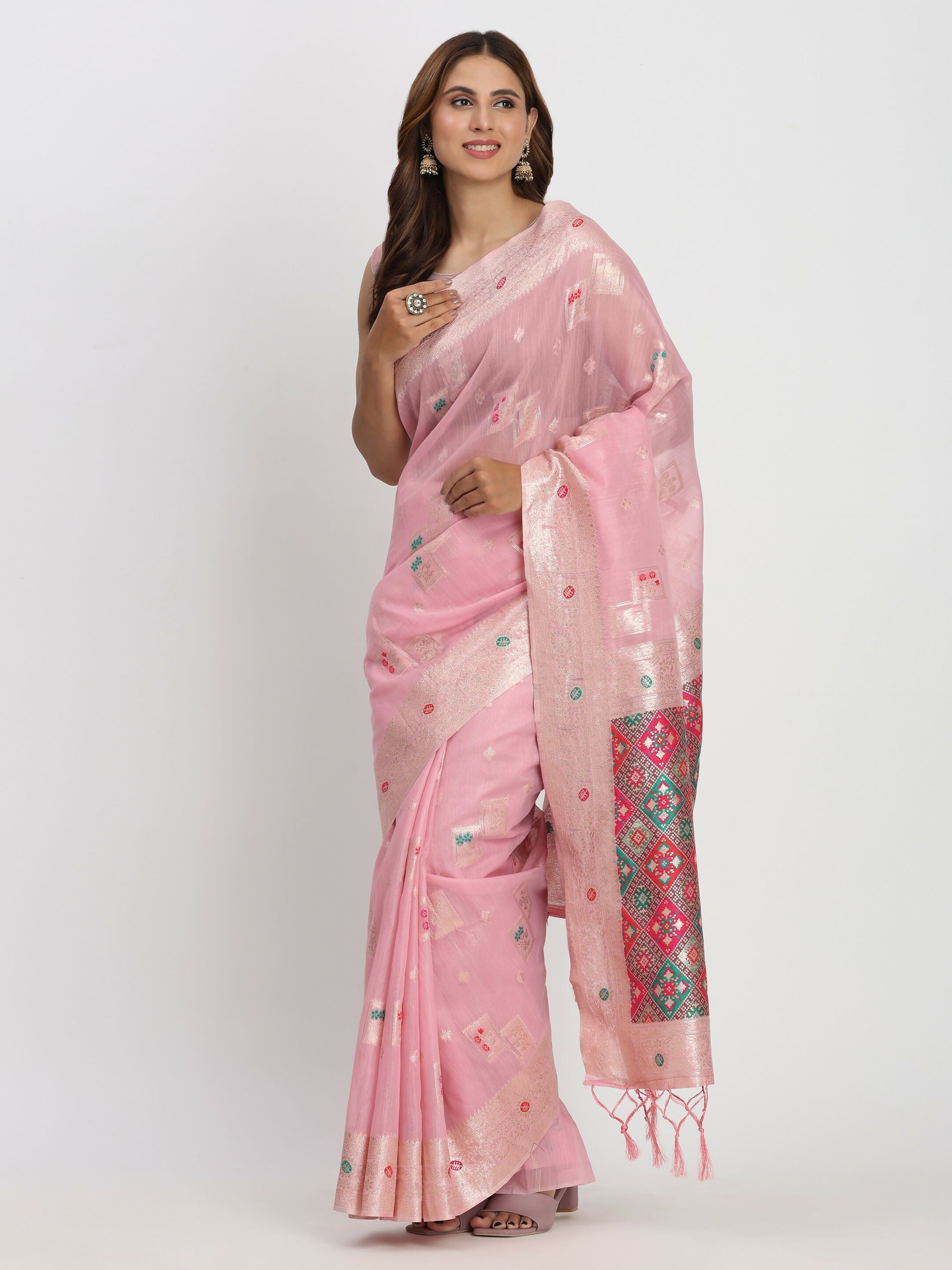 Light pink linen cotton saree draped elegantly with matching blouse
