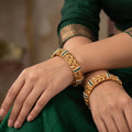 Designer Rajwadi polish antique bangles for a royal festive look