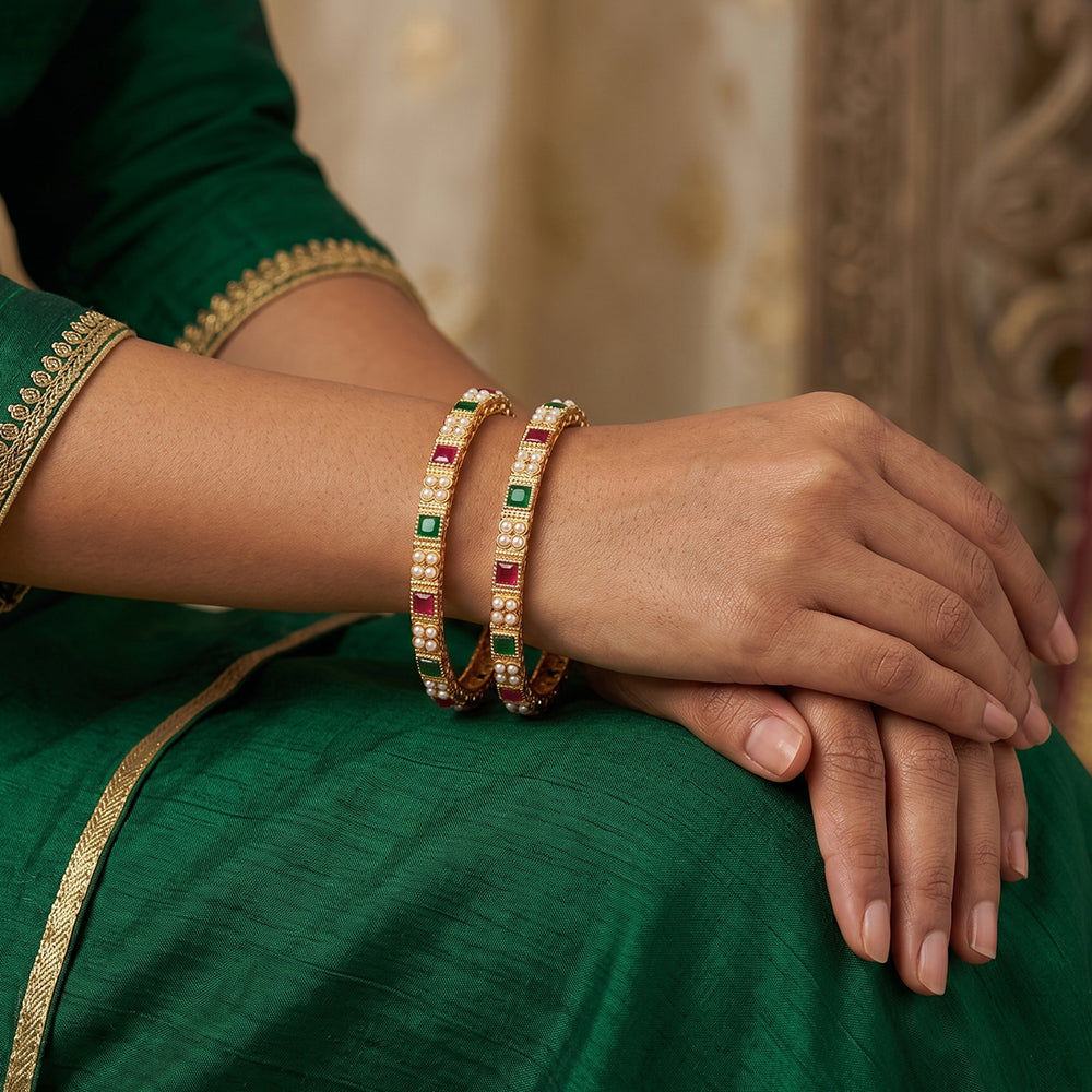 Set of 4 high gold polish designer bangles with intricate texture