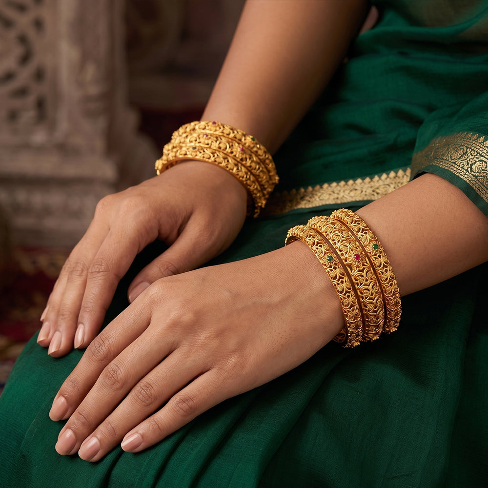 Stunning set of 6 high gold polish bangles arranged for a glamorous look