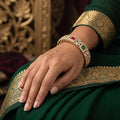 Sparkling American Diamond designer bangle set arranged for a formal occasion.