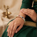 A luxurious set of premium multistone American diamond bangles.
