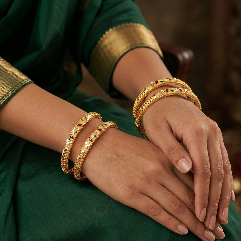 Traditional fancy bangle set featuring elegant motifs for women