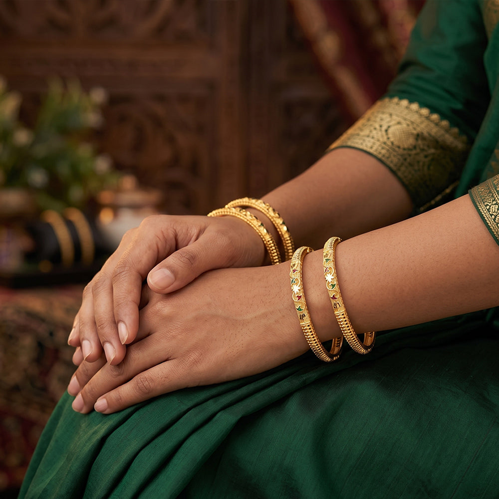 Set of antique-finish traditional designer bangles with intricate patterns