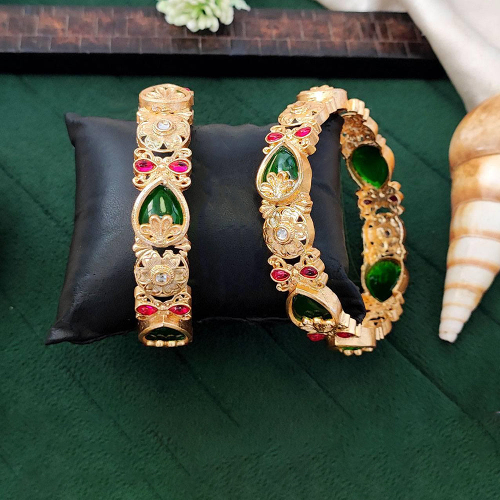 Intricate floral patterned bangles designed for wedding wear.