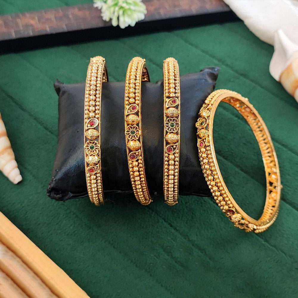 Refined antique gold designer bangle set for elegant festive wear