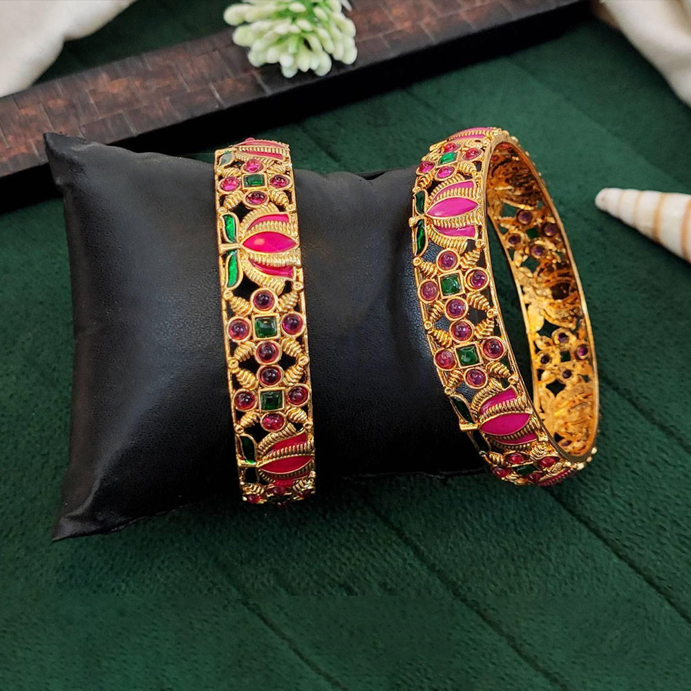 Close-up of traditional antique Kemp stone bangles with detailed metalwork