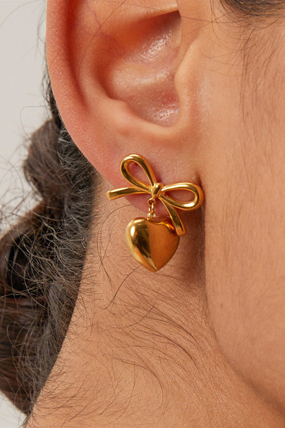 Gold Heart and Bow Studded Earrings