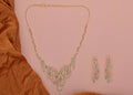 Close-up of Joban Fashion brass necklace set with golden finish and white AD stones